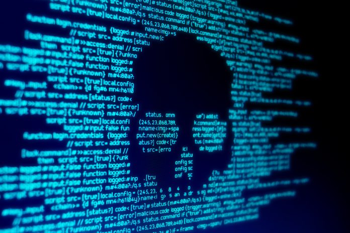 Une silhouette de crâne sur un écran d'ordinateur alors que les ordinateurs européens sont la cible des pirates israéliens.